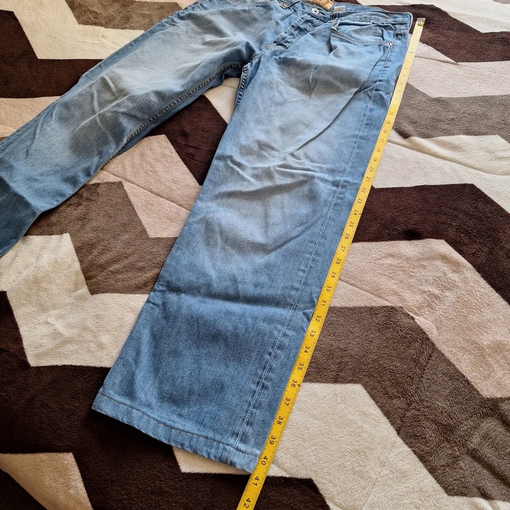 Men's Y2K jeans by RocaWear